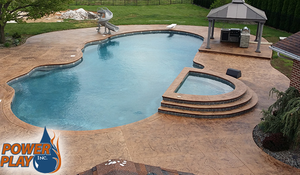 Stamped concrete after cleaning and sealing by Power Play