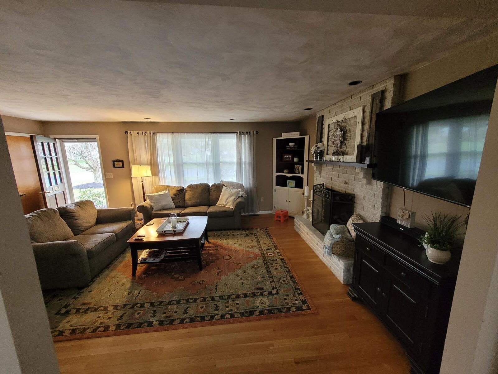 Freshly painted living room with bright walls and ceiling